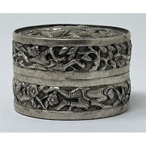 42 - An Indian silver coloured metal pill box, decorated a figure, 19.2 g