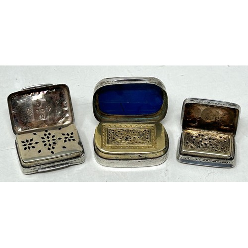 50 - A 19th century silver vinaigrette, marks rubbed, another, and a silver and enamel vinaigrette (3)