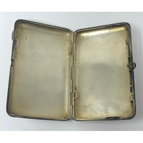 87 - A Continental silver coloured metal cigar case