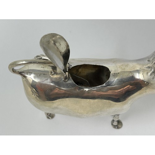 89 - A Continental silver coloured metal novelty creamer, in the form of a cow