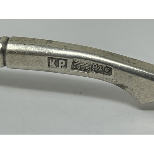 101 - A Russian silver coloured metal spoon, 1895