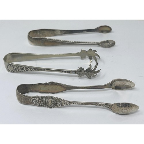 108 - A pair of Edward VII sugar tongs, 1908, another pair, 1943, and a silver coloured metal pair (3)