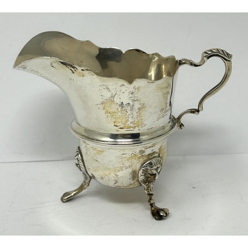 130 - An Edward VII silver cream jug, Birmingham 1909, 3.5 ozt