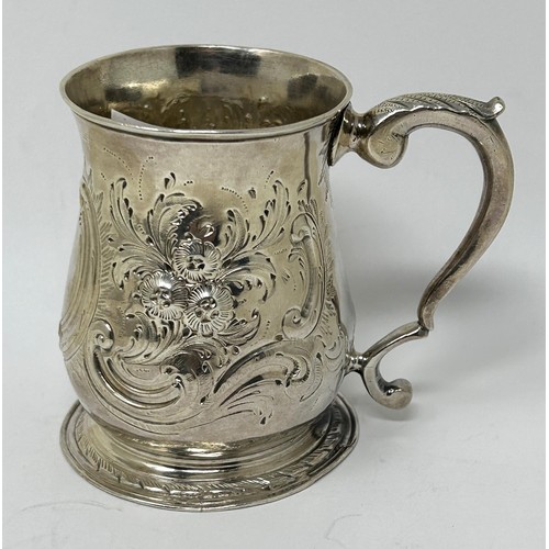 131 - A George III silver mug, marks rubbed, later decorated, 5.1 ozt