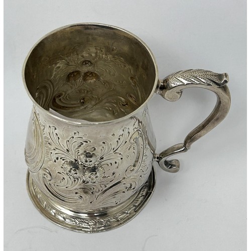 131 - A George III silver mug, marks rubbed, later decorated, 5.1 ozt