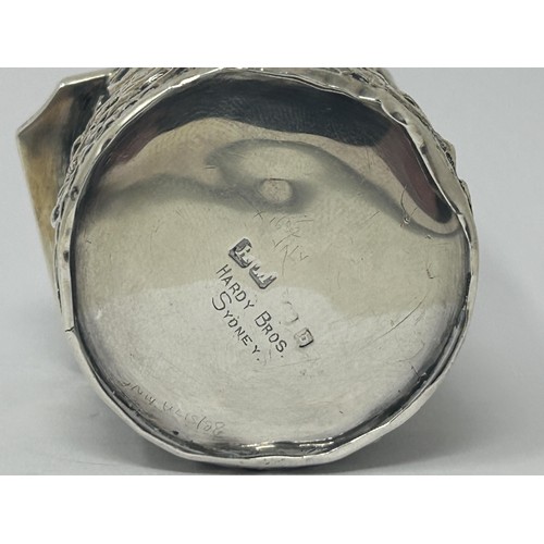 142 - A silver cased glass perfume bottle, marked Hardy Bros, Sydney, Birmingham 1901