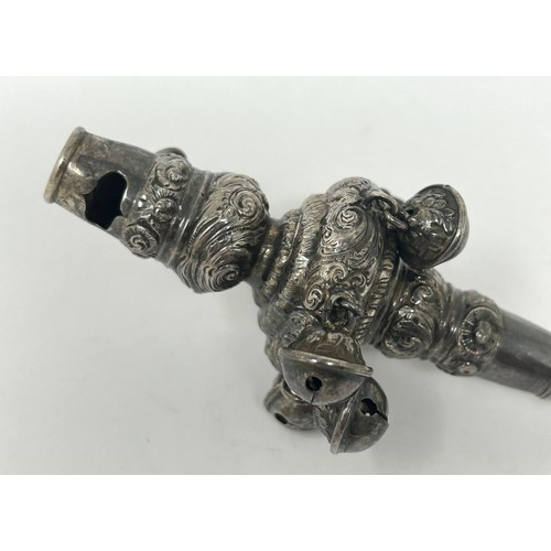 145 - A silver and coral baby's rattle, marks rubbed