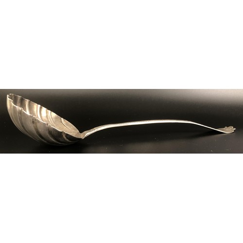 146 - A George III silver punch ladle, with a shell form bowl, by Robert Perth, marks rubbed, 4.9 ozt