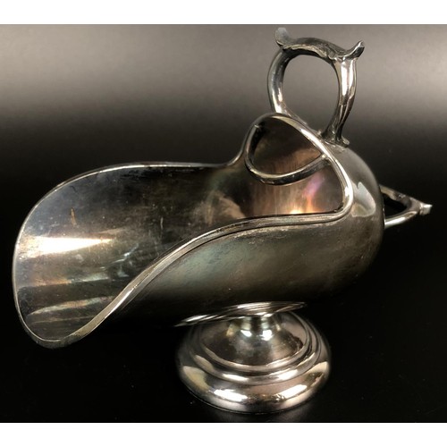 160 - A silver plated sugar hod, in the form of a coal helmet with shovel