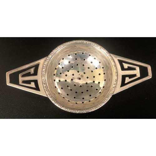 170 - A Continental silver coloured metal tea strainer