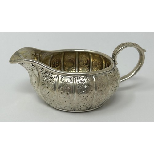 181 - A Victorian silver cream jug, by Hunt & Roskell, London 1868, 2.6 ozt