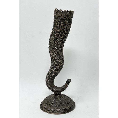 189 - An Indian silver coloured metal posy holder, 14 cm high