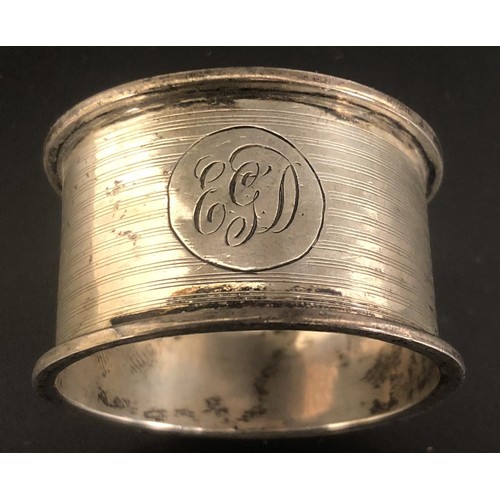 197 - Assorted napkin rings and a sifter spoon, various dates and marks, 5.9 ozt (8)