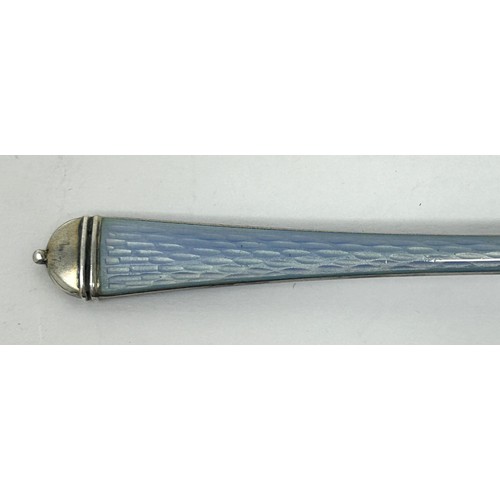 217 - A Continental silver coloured metal, blue and white enamel spoon