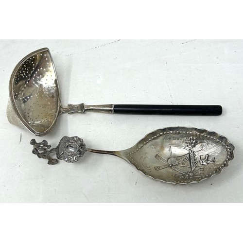 218 - A shell shaped dish, Birmingham 1903, a caddy spoon, a sifter spoon, and an oval tray, various dates... 