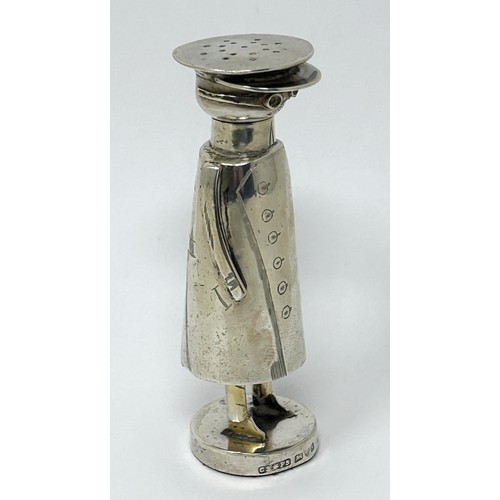 222 - An Edward VII novelty silver pepper, in the form of a chauffeur, Chester 1906, all in 51 g