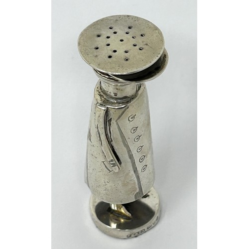 222 - An Edward VII novelty silver pepper, in the form of a chauffeur, Chester 1906, all in 51 g