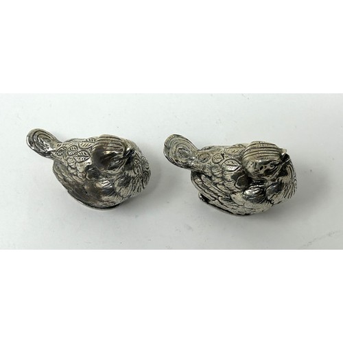 224 - A pair of Continental silver coloured metal novelty salts, in the form of chicks, 60.8 g (2)