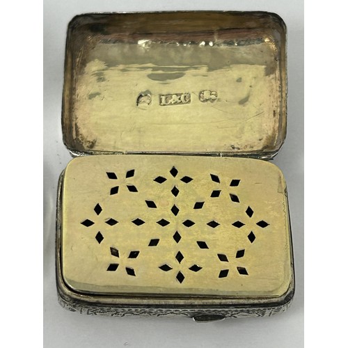 226 - A George III silver vinaigrette, London 1816, and a silver and purple enamel compact (2)