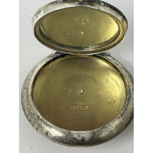 226 - A George III silver vinaigrette, London 1816, and a silver and purple enamel compact (2)