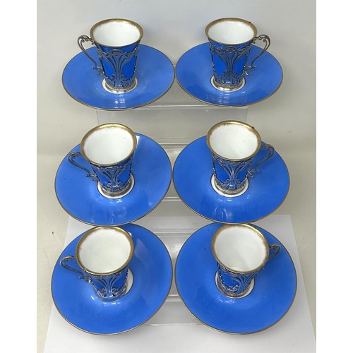 44 - A set of six porcelain and silver mounted coffee cans, London 1906