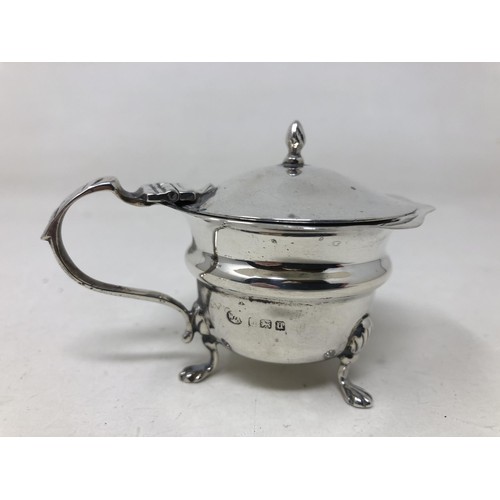 71 - A pair of George V silver salts, with blue glass liners, another pair, a mustard pot and assorted sp... 