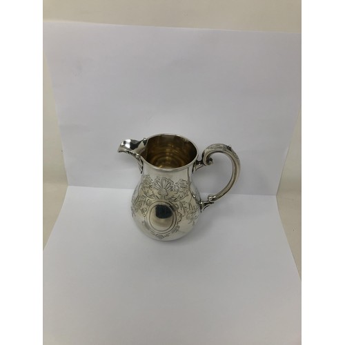 73 - A Victorian silver cream jug, by Charles Stuart Harris, London 1869, 8.7 ozt