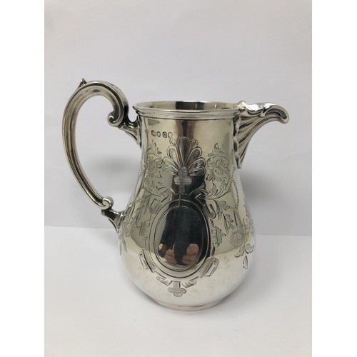 73 - A Victorian silver cream jug, by Charles Stuart Harris, London 1869, 8.7 ozt