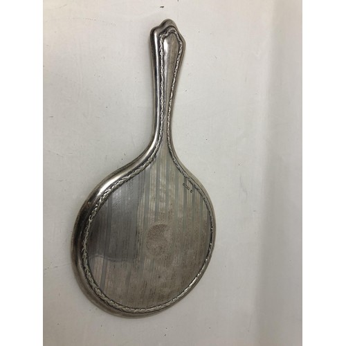 70 - A pair of silver salts, a pepper pot, two napkin rings, a fork and spoon 6.6 ozt, a silver backed mi... 