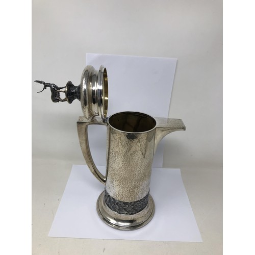 81 - An Elizabeth II silver coffee pot, with a stag finial, by Hector Miller, London 1978, 42.2 ozt