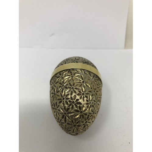 83 - A silver gilt Easter egg, by Stuart Devlin, No 101, cased with receipt, 5.75 ozt