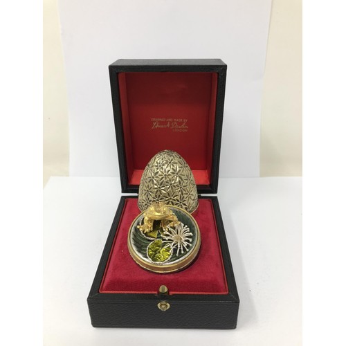 83 - A silver gilt Easter egg, by Stuart Devlin, No 101, cased with receipt, 5.75 ozt