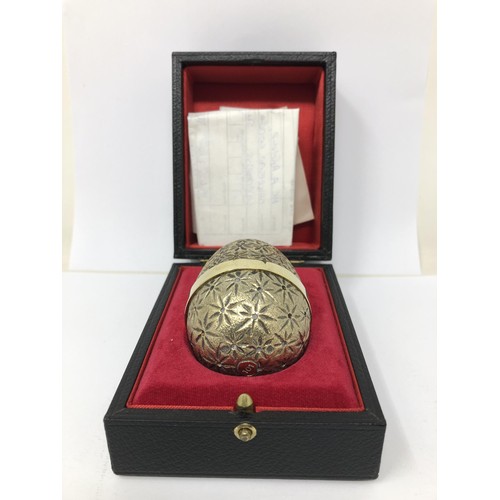 83 - A silver gilt Easter egg, by Stuart Devlin, No 101, cased with receipt, 5.75 ozt