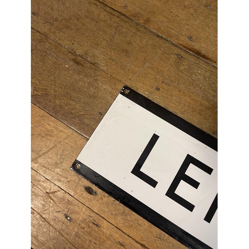 113 - A London Underground enamel sign, Leicester Square, 23 x 170 cm