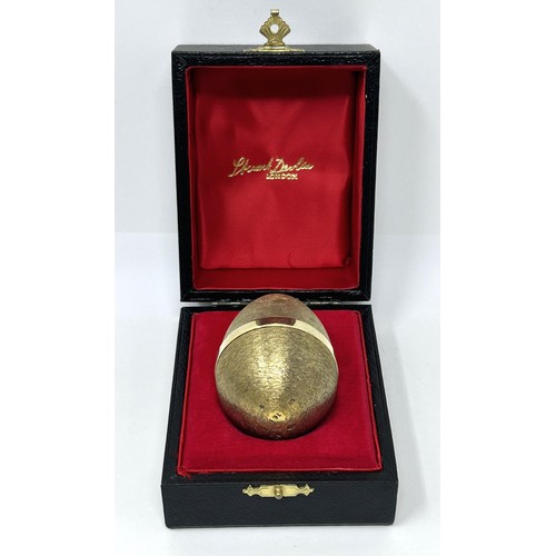 84 - A silver gilt Easter egg, by Stuart Devlin, No 35, London 1979, 3.46 ozt, cased, with receipt