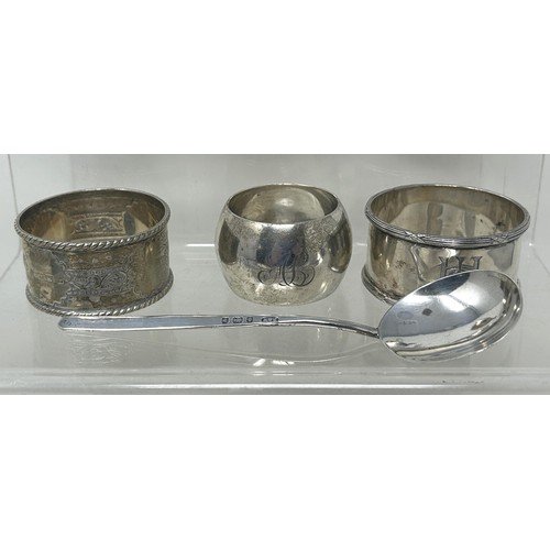 121 - A George V silver goblet, a trophy cup, 2.1 ozt, assorted napkin rings and other items (box)