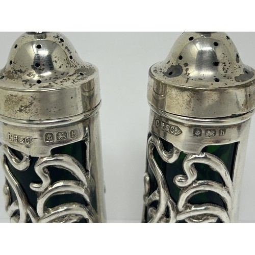 187 - An Art Nouveau silver three piece cruet set, Birmingham 1907