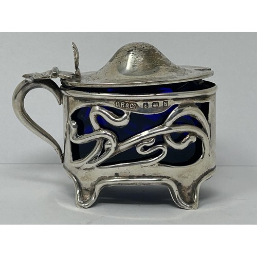 187 - An Art Nouveau silver three piece cruet set, Birmingham 1907