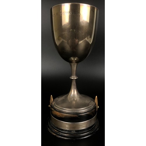 280 - A Victorian silver trophy cup, on an ebonised base, Sheffield 1891, 20 cm high