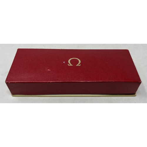 349 - A gentleman's 14ct gold Omega wristwatch, lacking strap, in an associated Omega box