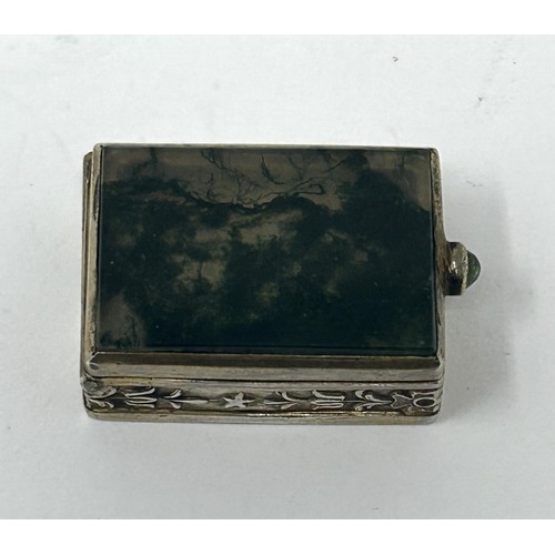 413 - A Continental gilt silver coloured metal and moss agate type green stone box, 3 cm wide