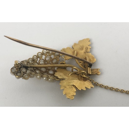 419 - A yellow coloured metal and seed pearl brooch, in the form of bunch of grapes