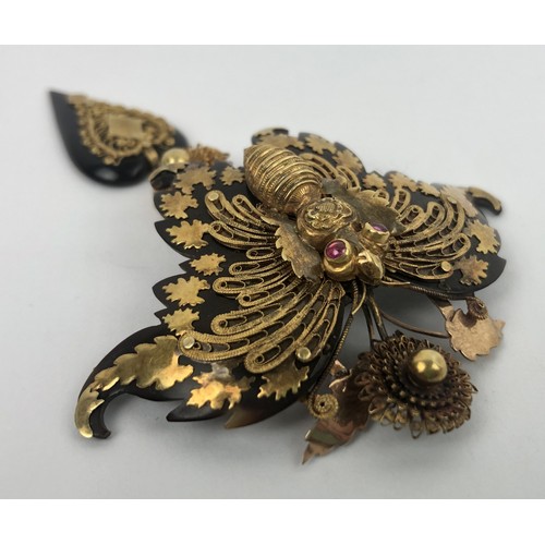 420 - A large Victorian yellow coloured metal and tortoiseshell brooch, in the form of a butterfly, in a l... 