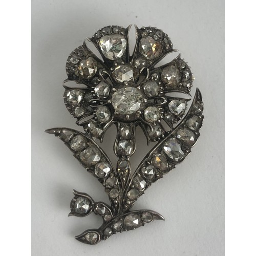 427 - A 19th century diamond brooch, in the form of a flower