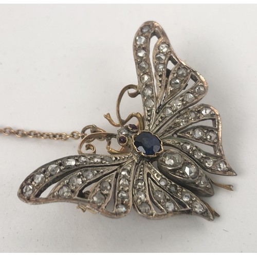 429 - A late 19th/early 20th century diamond, sapphire and red stone brooch, in the form of a butterfly