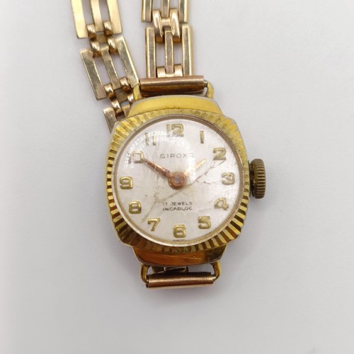 363 - A 9ct gold chain, 3.3 g, and a ladies Giroxa wristwatch, on a 9ct gold strap (2)