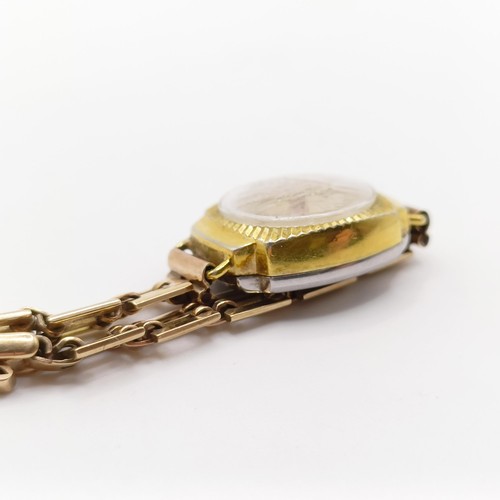 363 - A 9ct gold chain, 3.3 g, and a ladies Giroxa wristwatch, on a 9ct gold strap (2)