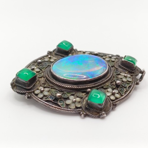 409 - An Arts and Crafts silver coloured metal, opal, green stone and enamel brooch, by Jean Bassett  Prov... 