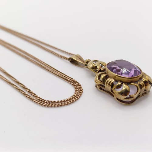 437 - An amethyst pendant, on a 8ct gold chain