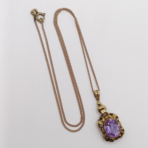 437 - An amethyst pendant, on a 8ct gold chain